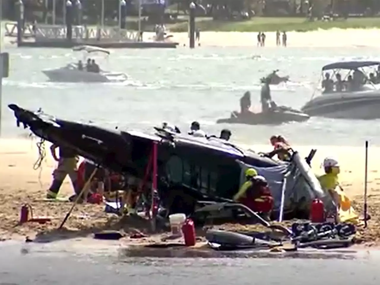 Helicopters collide over Australian beach, 4 passengers dead