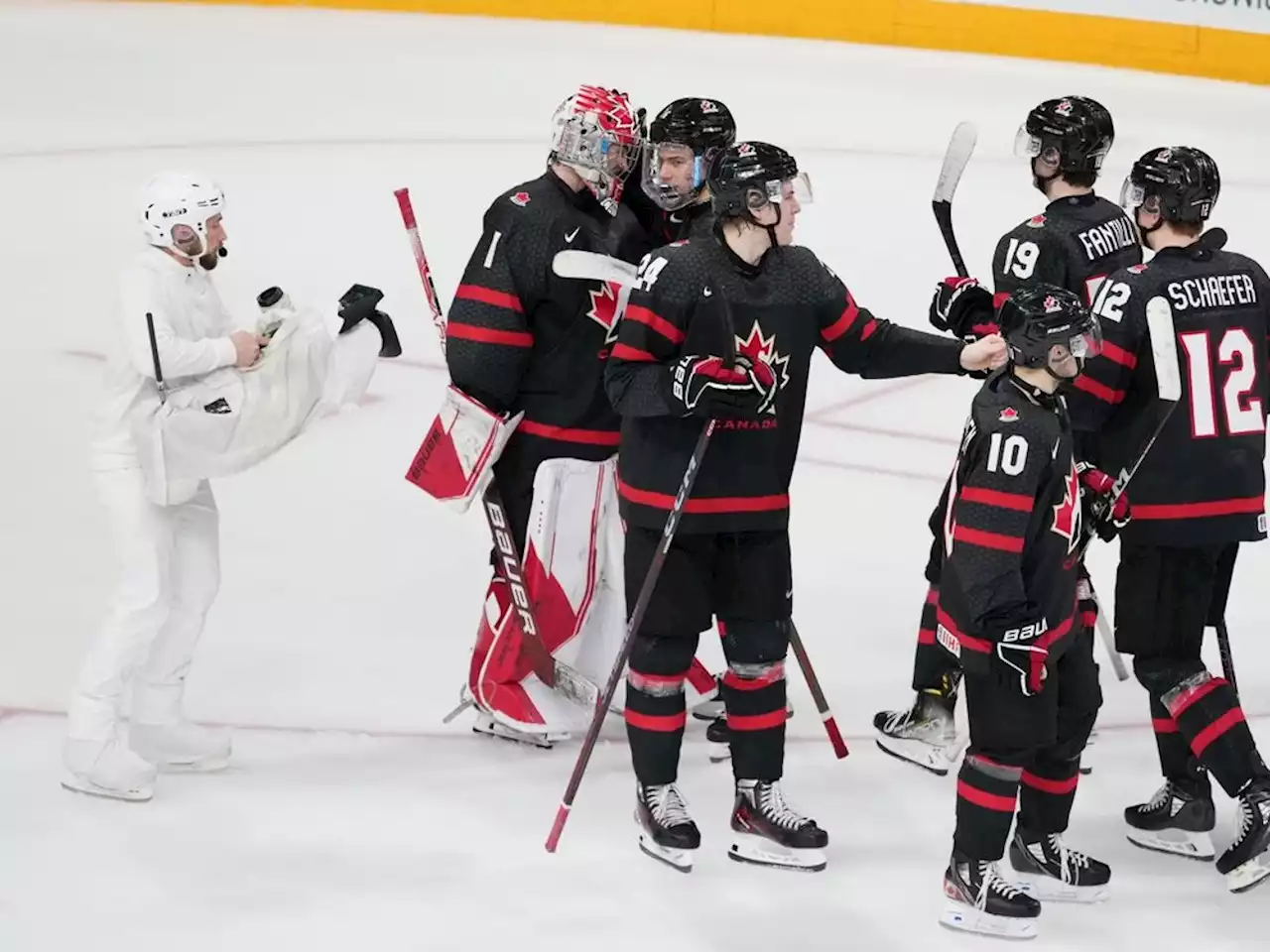 Camouflaged cameraman a hit at world juniors: 'I have the best seat in the house'