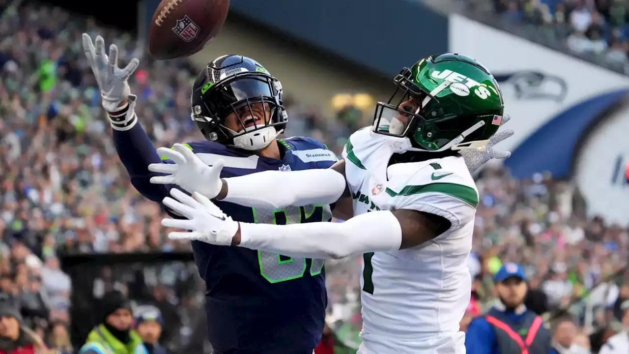 Seahawks keep playoff hopes alive with win, eliminate Jets