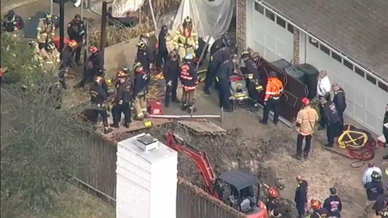 SkyEye video shows firefighters rescue worker trapped in collapsed hole in west Houston