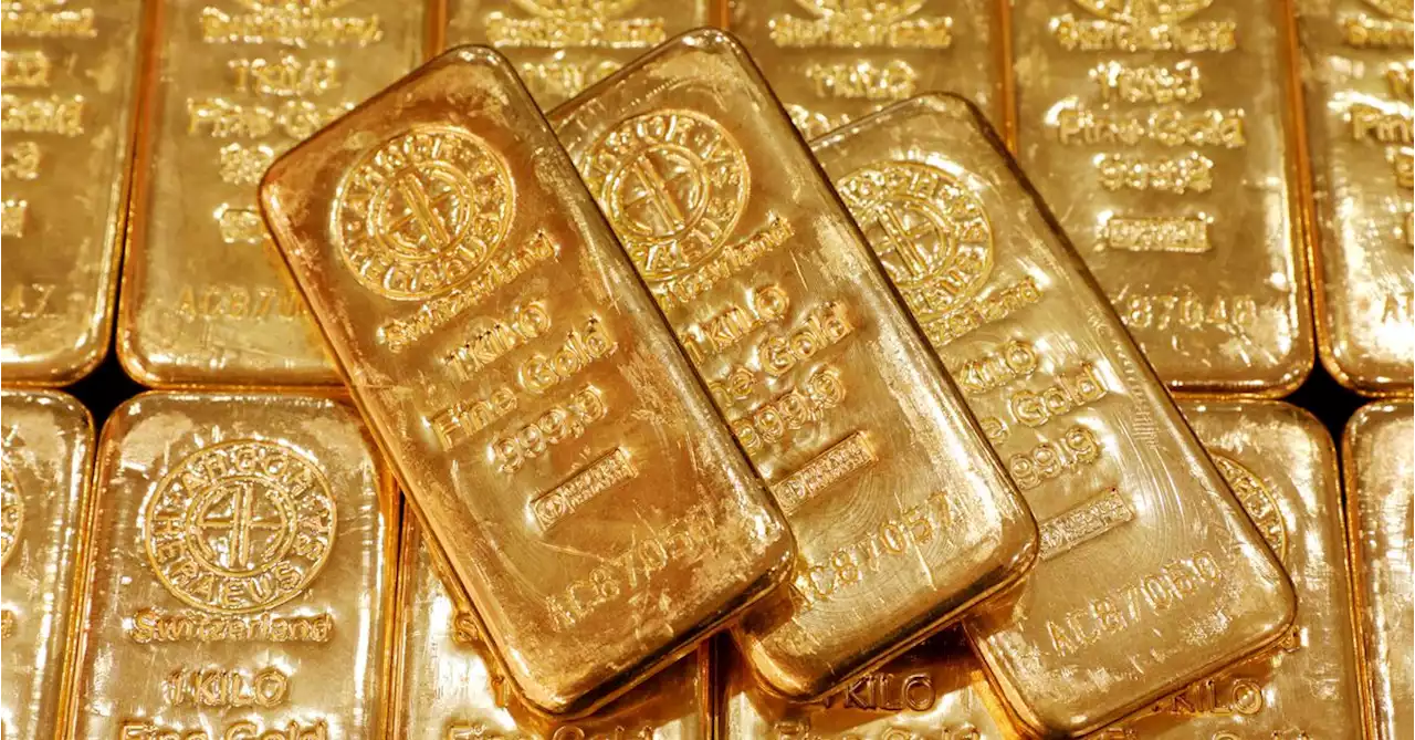 Gold eases but set for fifth straight weekly rise on Fed slowdown bets