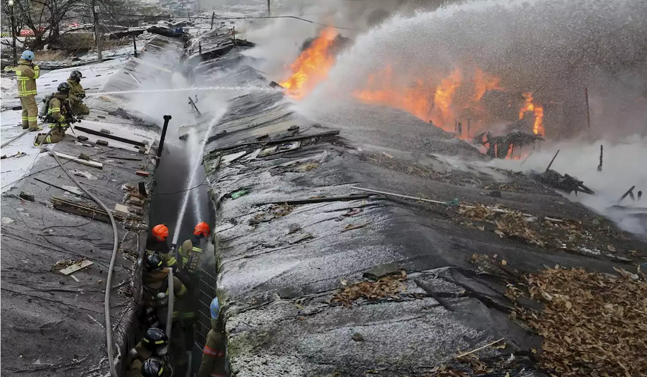 Fire rips through Seoul neighborhood, forcing hundreds to flee