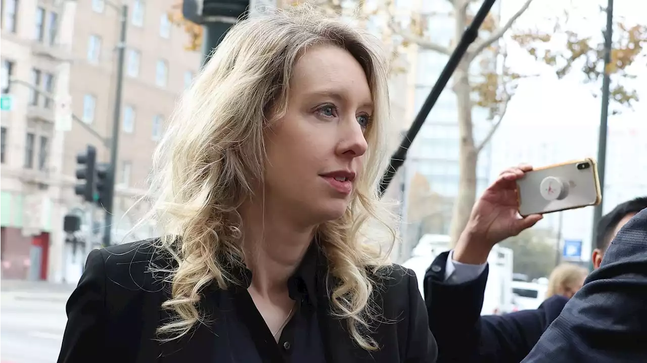 Elizabeth Holmes tried 'to flee the country' after conviction, prosecutors say