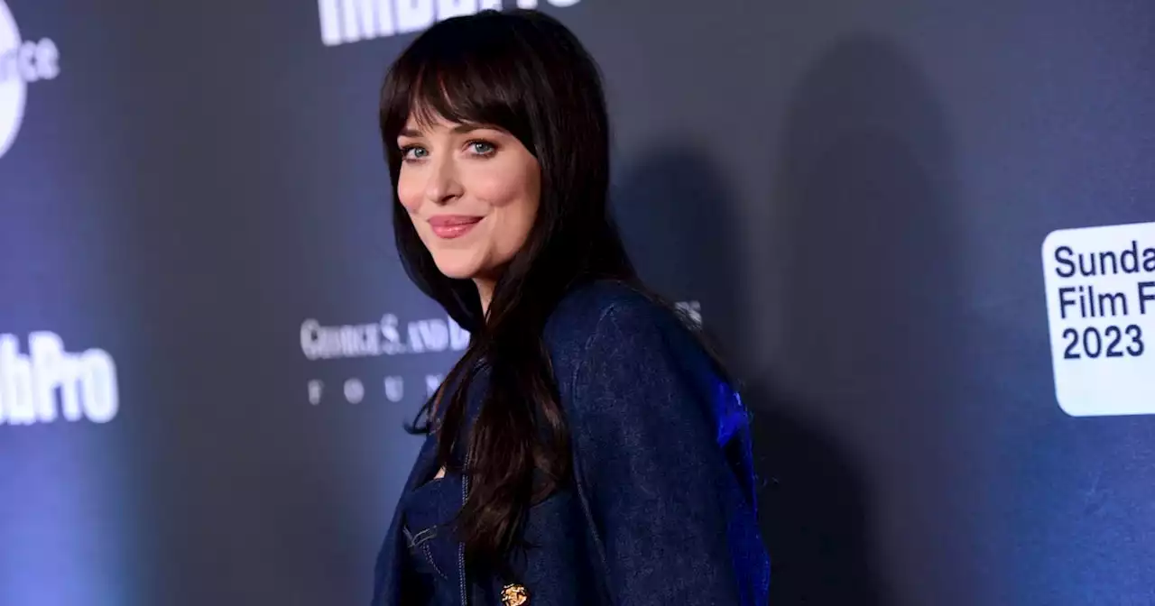 Dakota Johnson Pulls Off a Triple Denim Look With a Corset Top