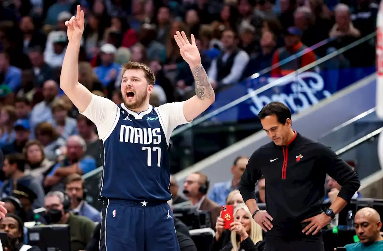 Luka Doncic stars in Mavericks' rout of Heat