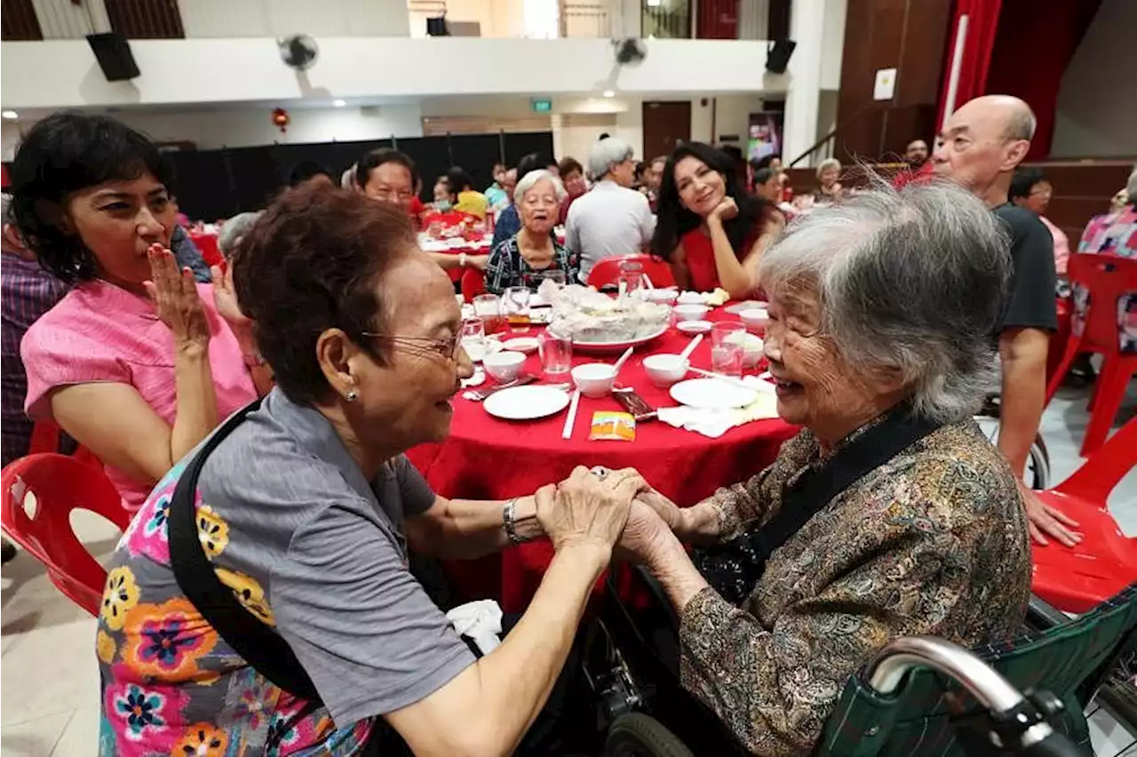 Lonely elderly residents of Henderson-Dawson gather for Chinese New Year’s Eve reunion lunch