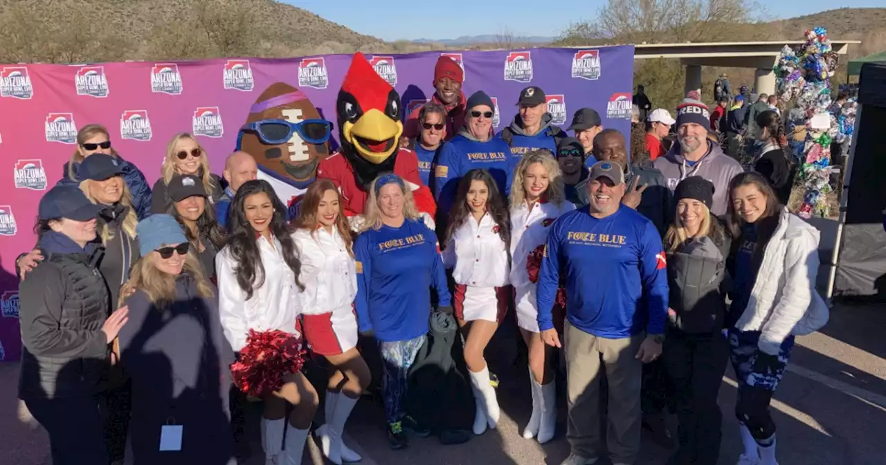 NFL Green hosts trash, snail clean up event along Salt River