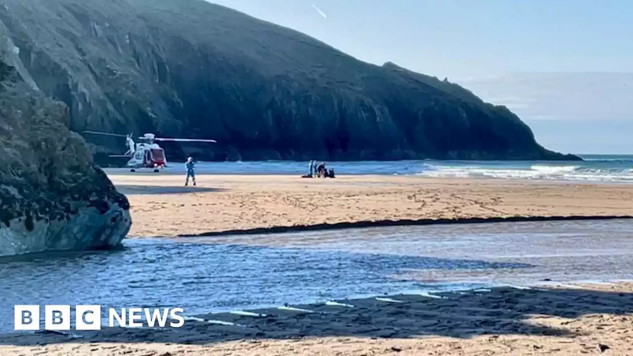 Father and son rescued at Holywell Bay