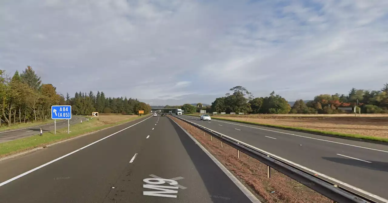 Two men rushed to hospital and road closed after Scots motorway crash