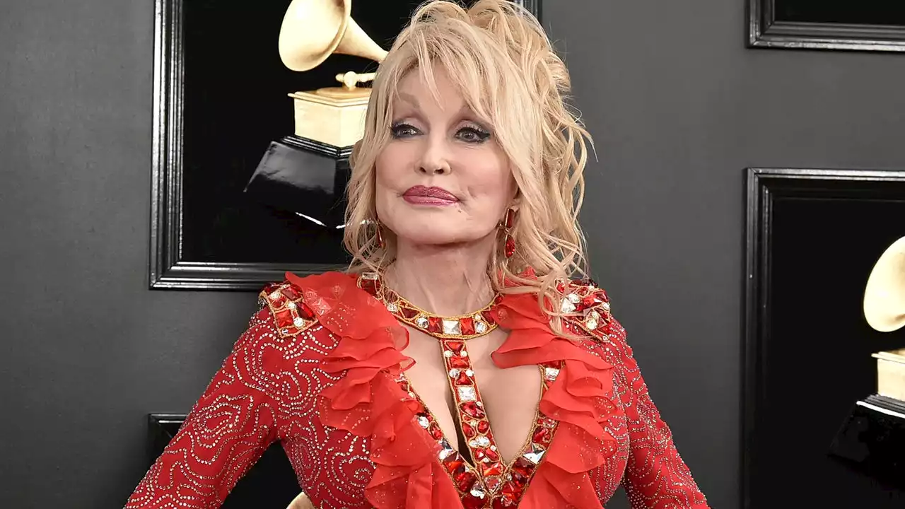 Dolly Parton talks requirements for the future actress playing her: 'She'd have to have some boobs, of course'