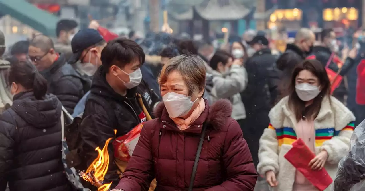 China reports almost 13,000 new Covid-19 deaths as country rings in Lunar New Year