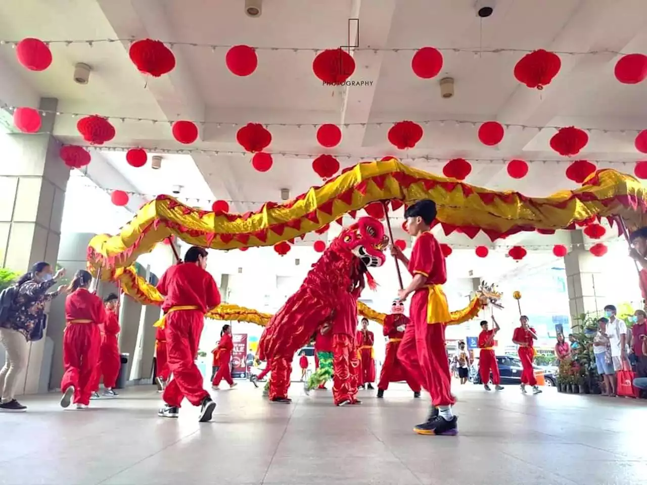 Merrymakers enjoy Dragon and Lion dance highlighting Chinese Year celebration at SM Lucena