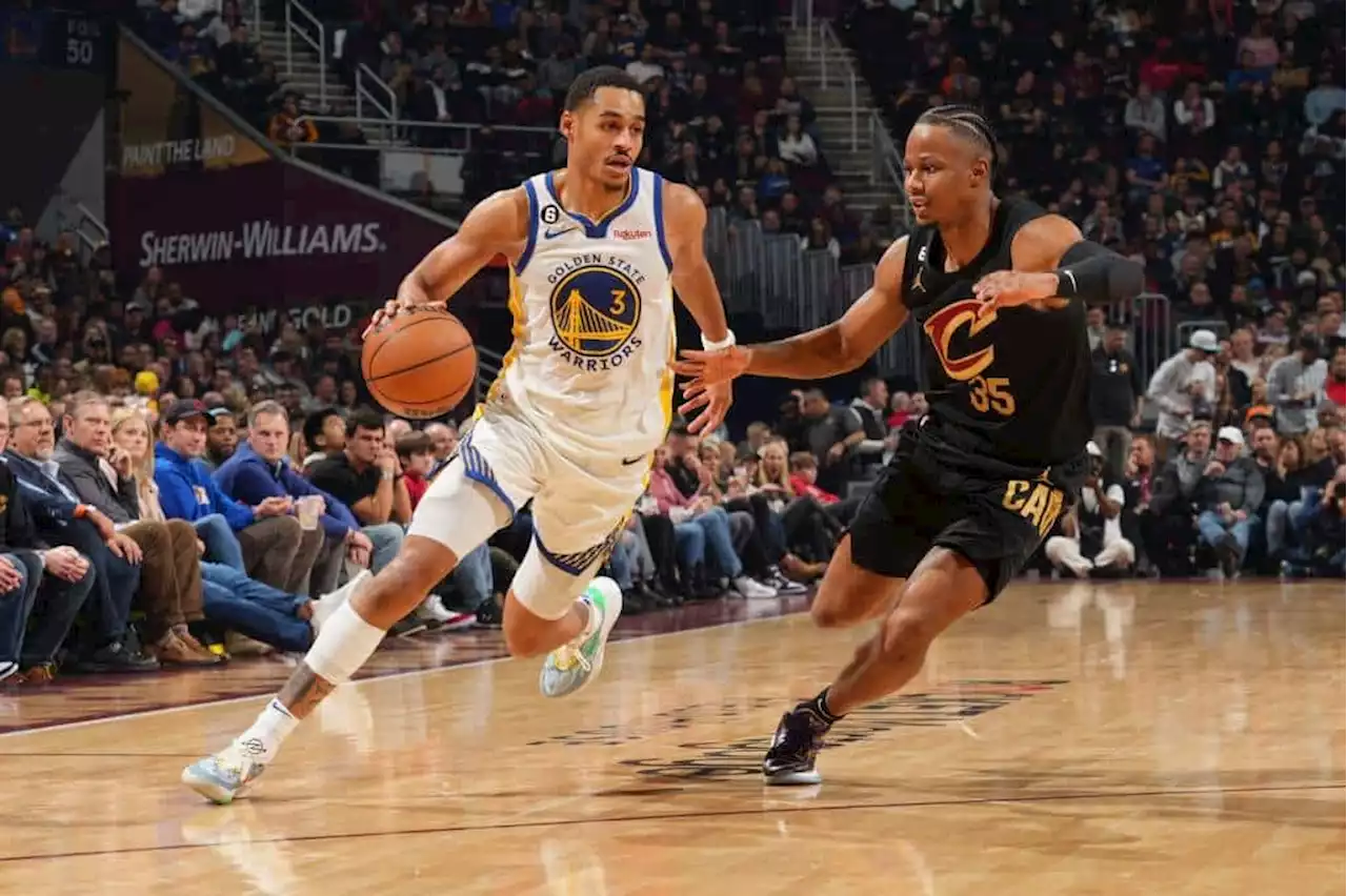 Short-handed Warriors ride three-point barrage to beat Cavs