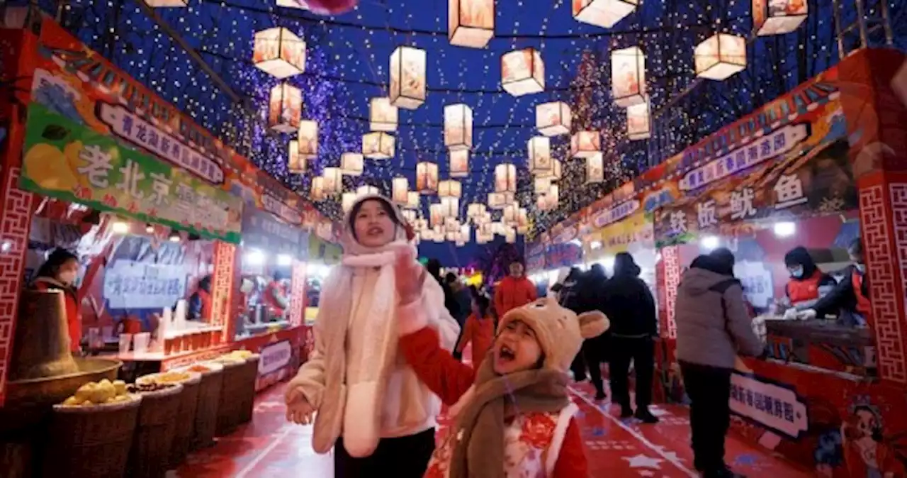 Chinese pray for health in Lunar New Year as Covid-19 death toll rises