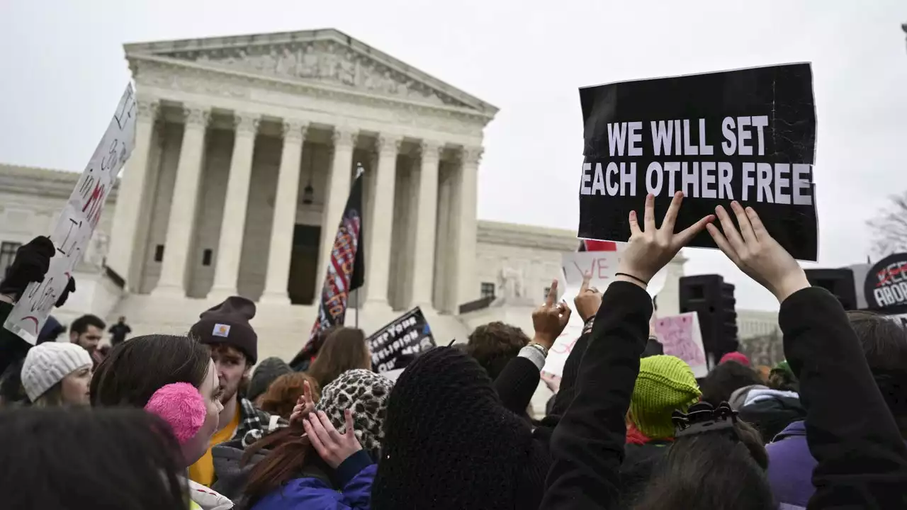 'We won't go back': Abortion rights activists rally 50 years after Roe