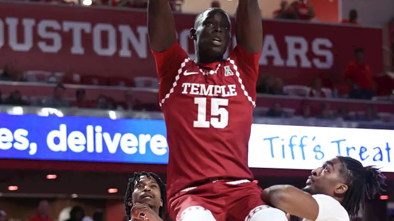 Dunn scores 16, Temple defeats No. 1 Houston 56-55