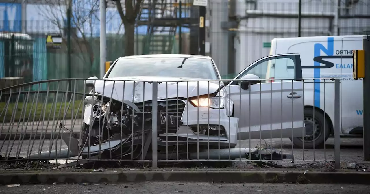 Audi driver smashes car into barrier at crossing outside Etihad stadium