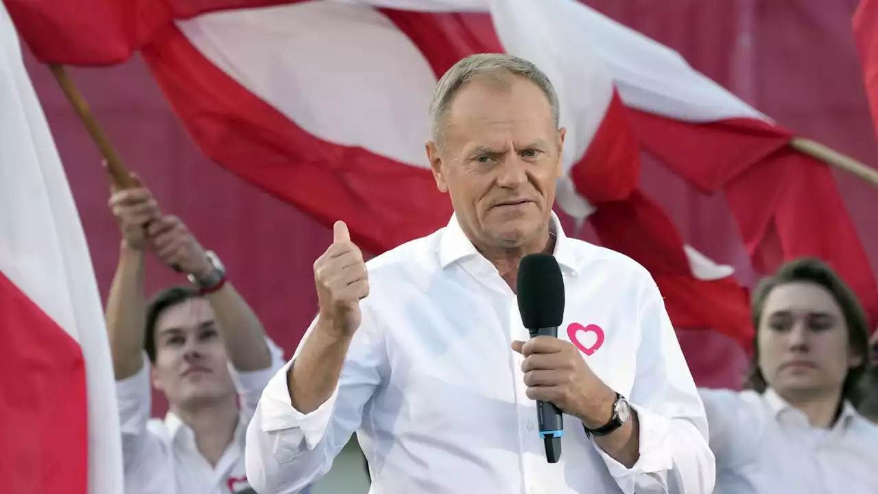 Polish opposition head Donald Tusk leads march to boost chances to unseat conservatives in election