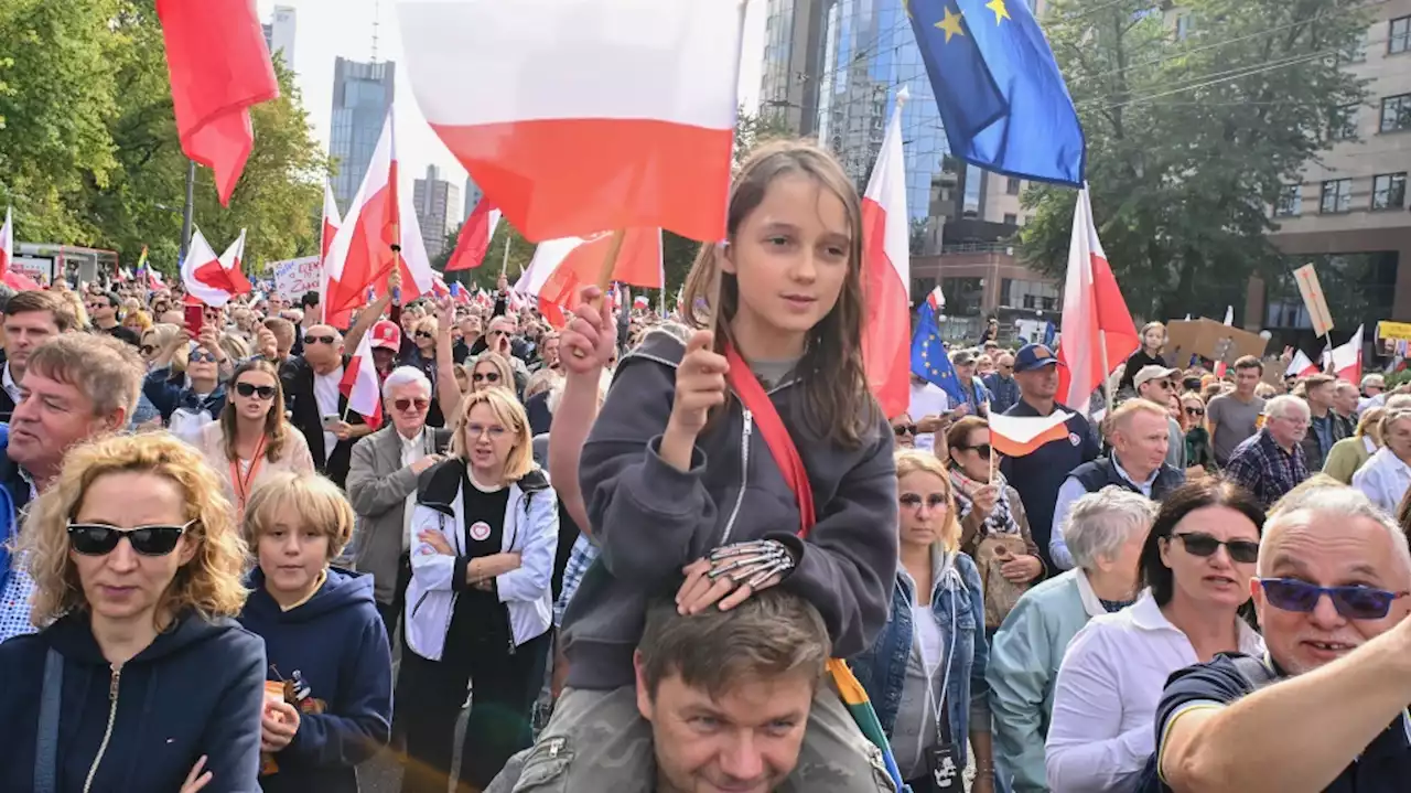 Polish opposition head Donald Tusk leads march to boost chances to unseat conservatives in election