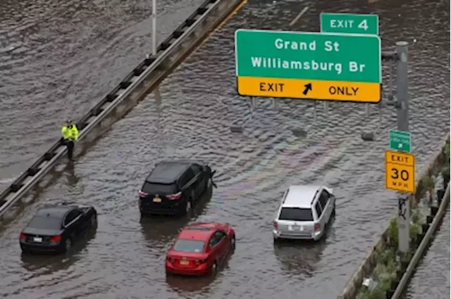 Climate change means New York City’s flooding is ‘new normal’, governor says