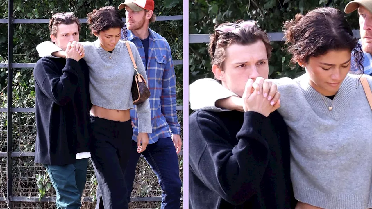 Tom Holland Sweetly Kisses Zendaya's Hand During Stroll Through London