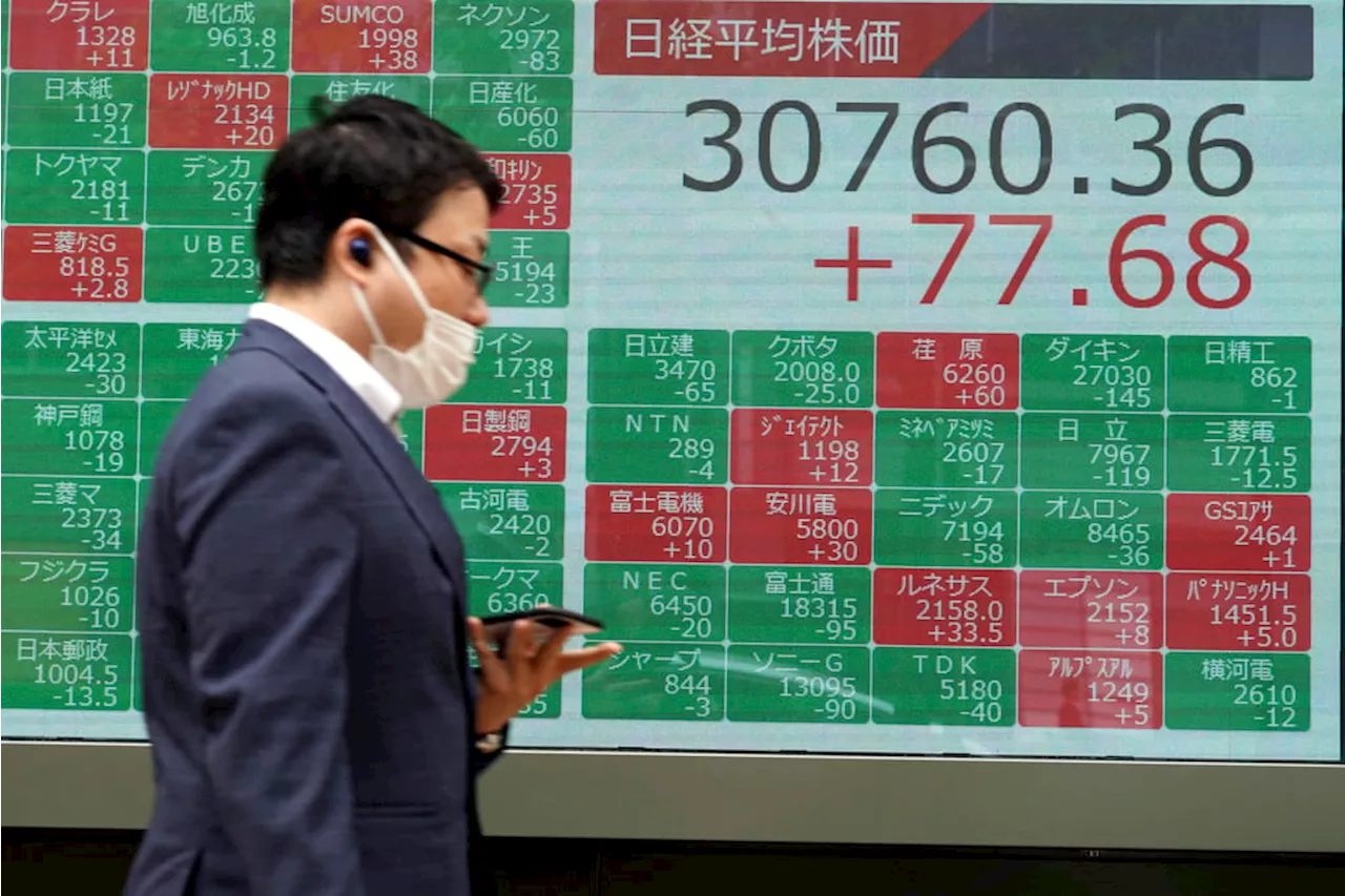 Asian shares rise after Fed comments, Middle East in focus