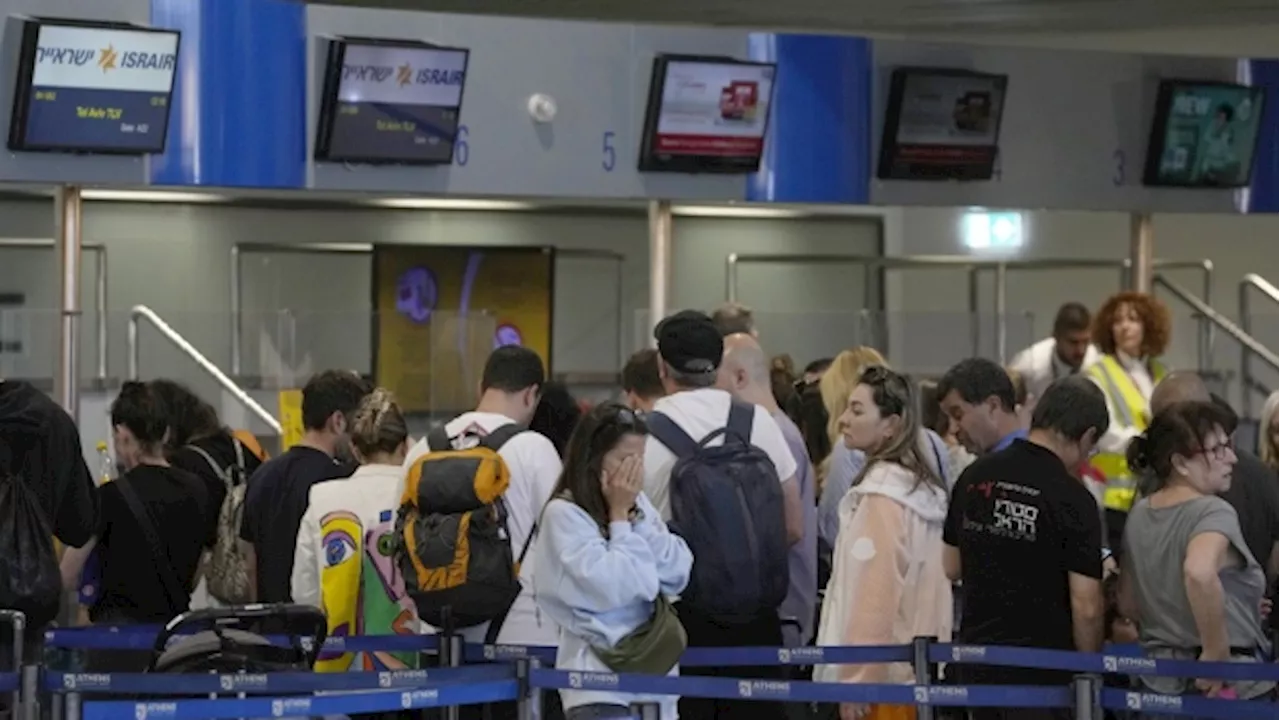 Some Israelis abroad desperately try to head home