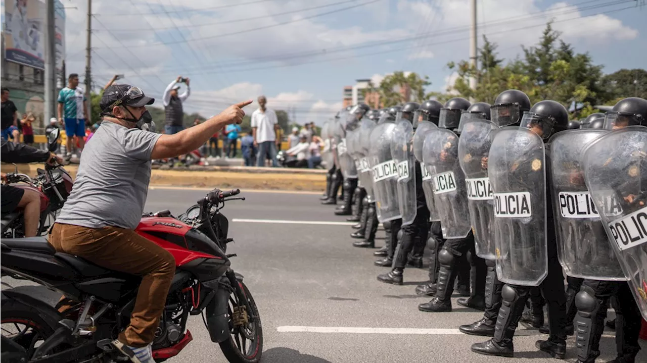 Guatemalan police begin clearing protesters' roadblocks after president threatens a crackdown