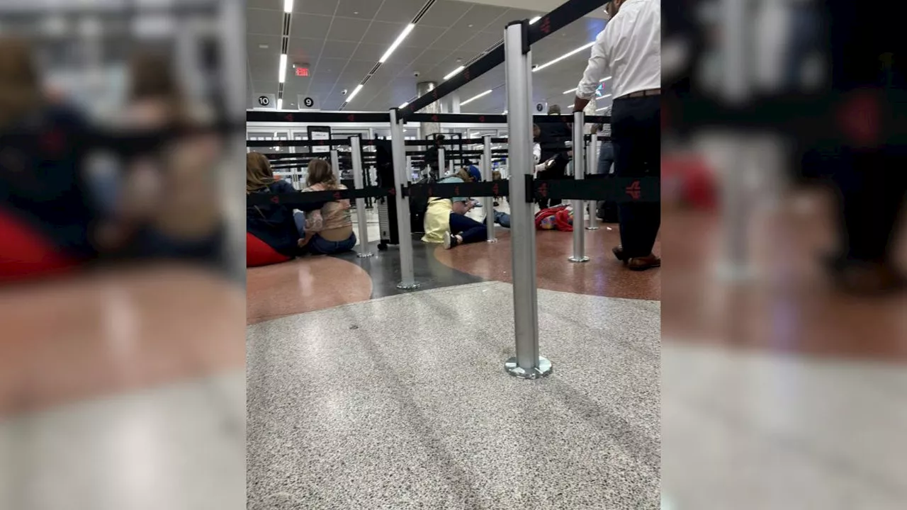 2 stabbed, including police officer, in security terminal at Atlanta International Airport