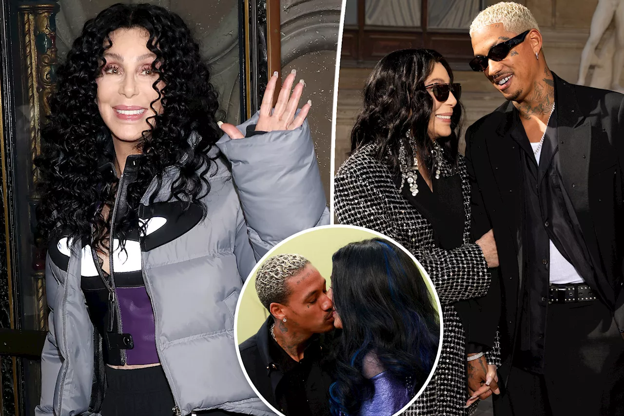 Cher defends much-younger boyfriend Alexander 'AE' Edwards' diamond teeth, tattoos, white hair