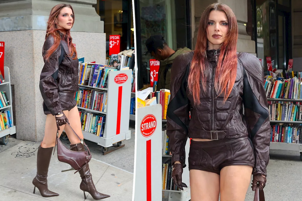 Julia Fox flexes her abs in padded leather illusion jacket and hot pants for book promo