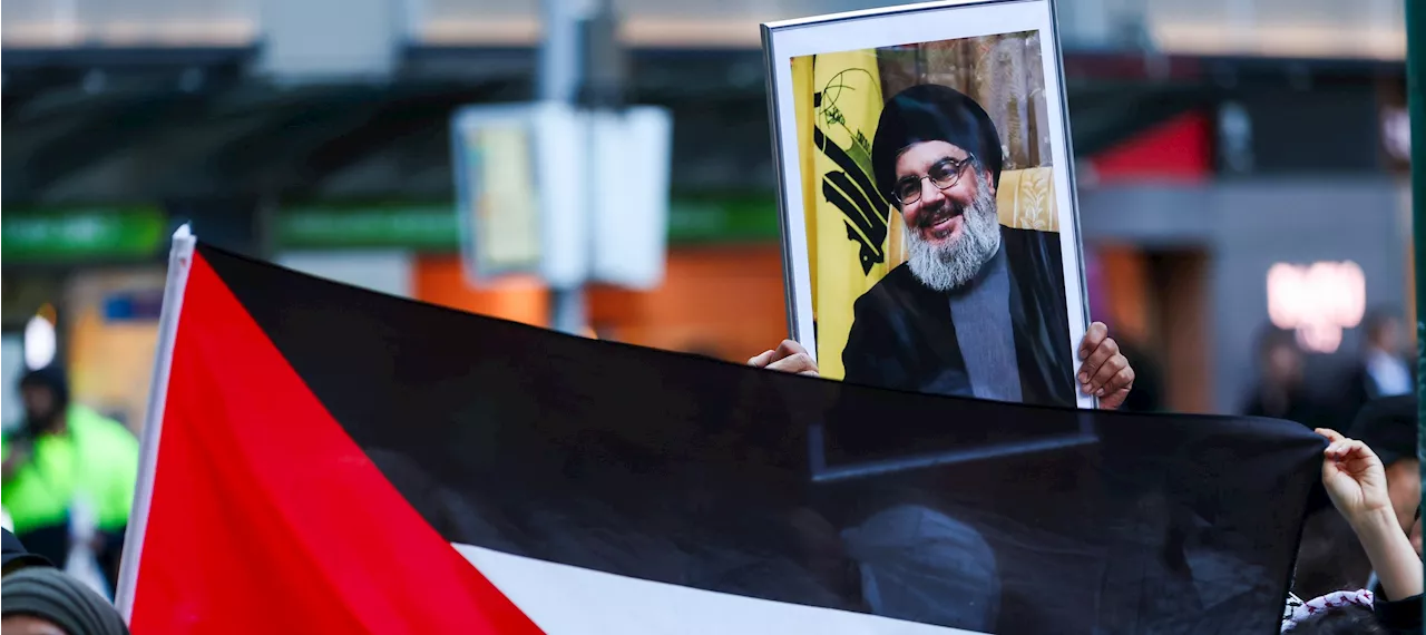 ‘Disturbing’: Pro-Palestine supporters condemned for holding up image of Hezbollah leader