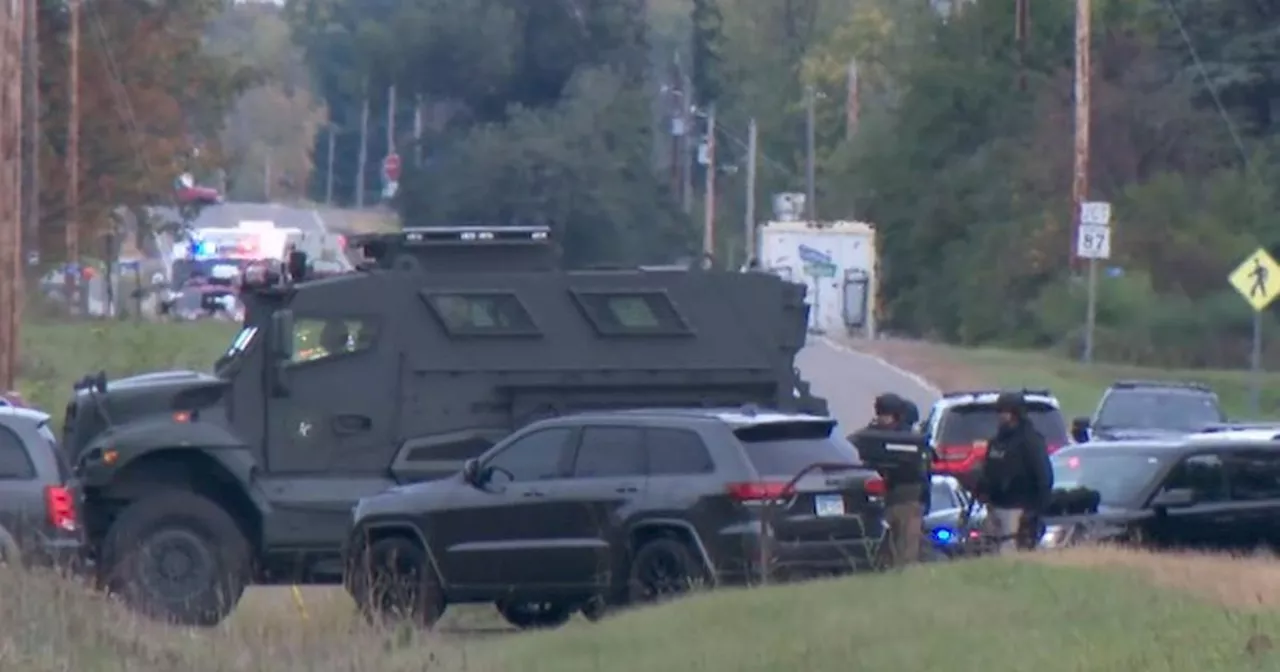 SWAT team surrounds gunman after five police officers shot in America