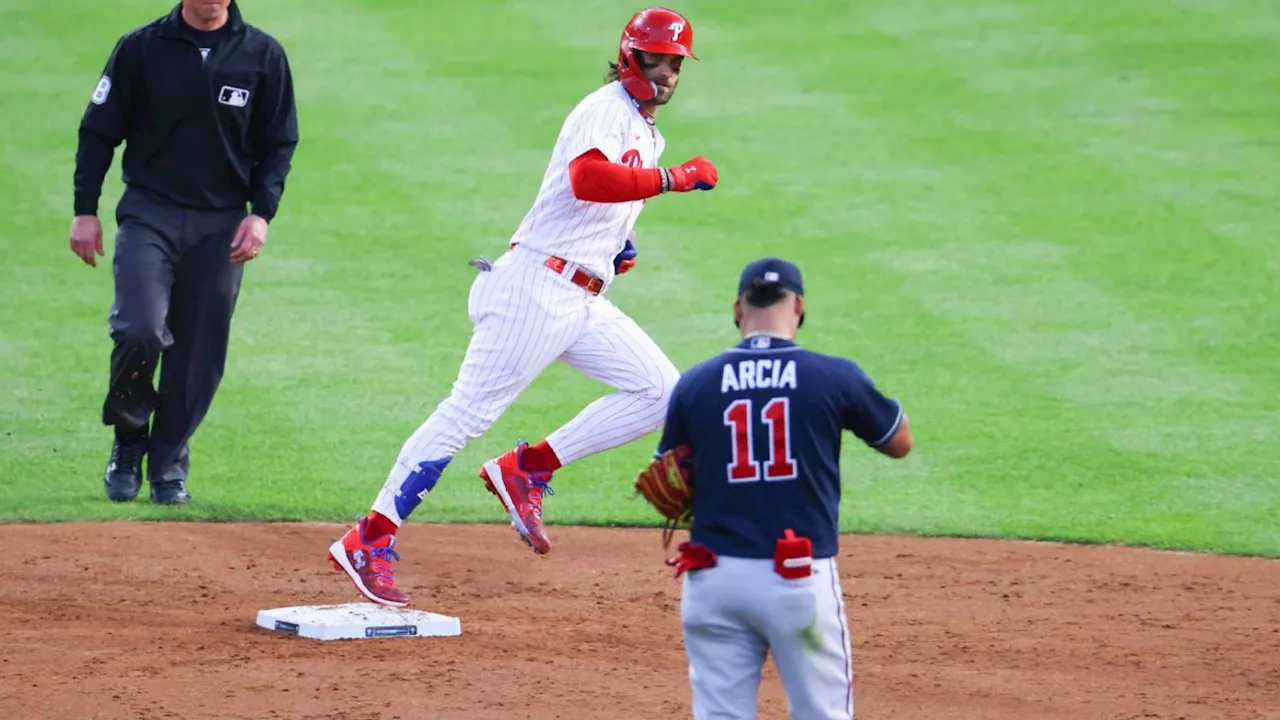 Bryce Harper hits 2 of Phils' 6 HRs, stares down Orlando Arcia