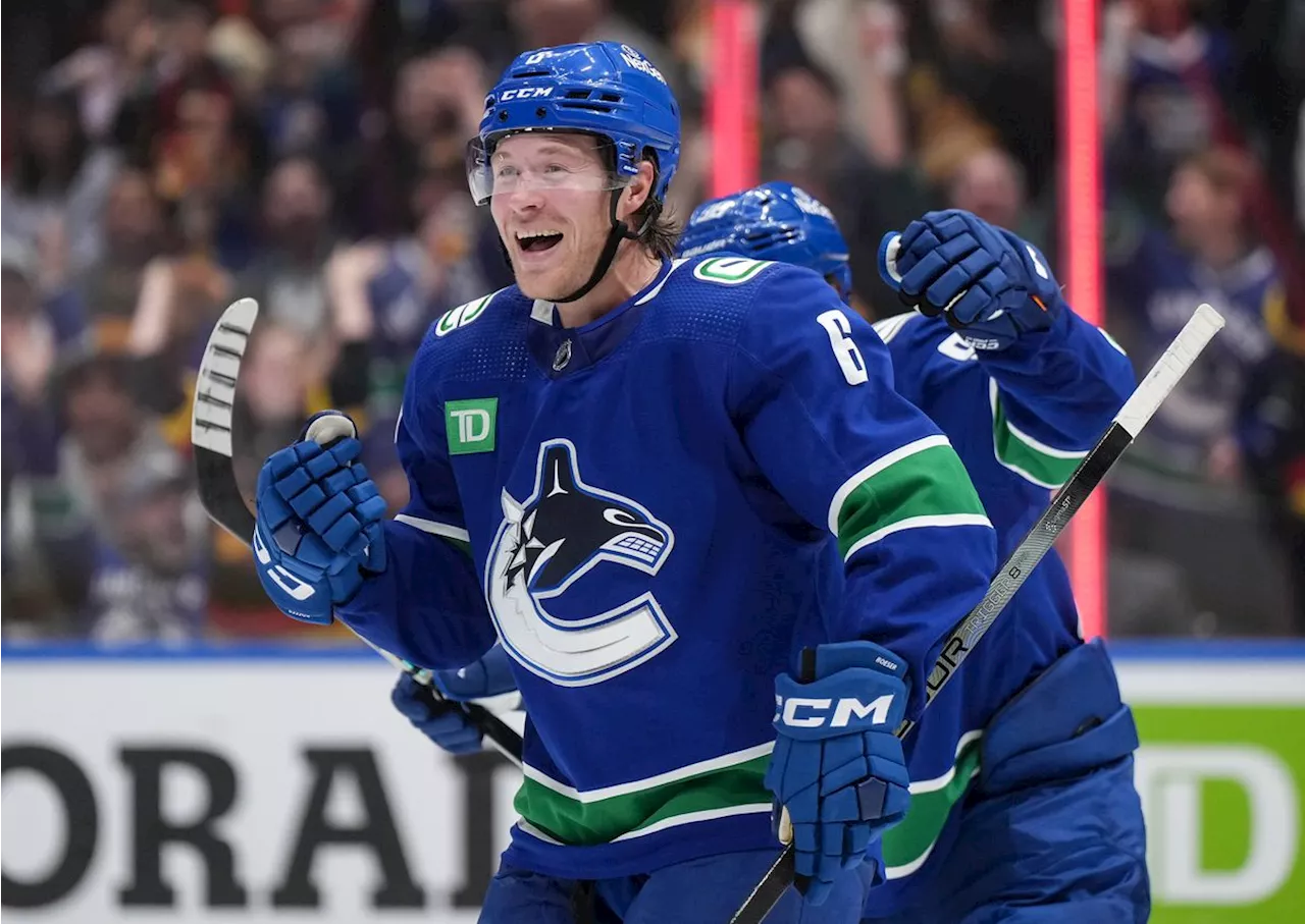 Boeser scores four goals, Canucks rout Oilers 8-1 to start a home-and-home opening set