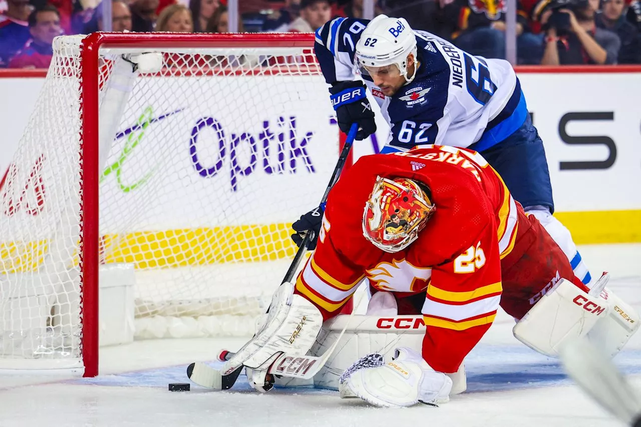 Mangiapane paces Flames to season-opening 5-3 win over Jets