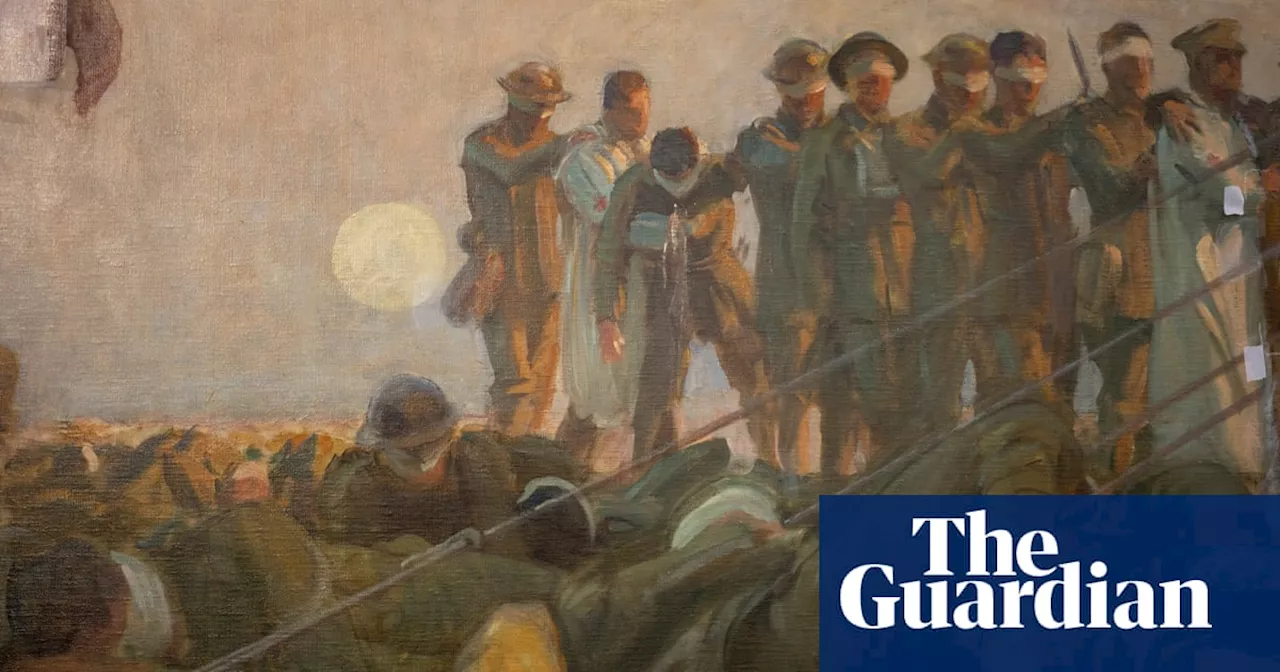 ‘It glows’: restorer removes queasy look from first world war painting Gassed