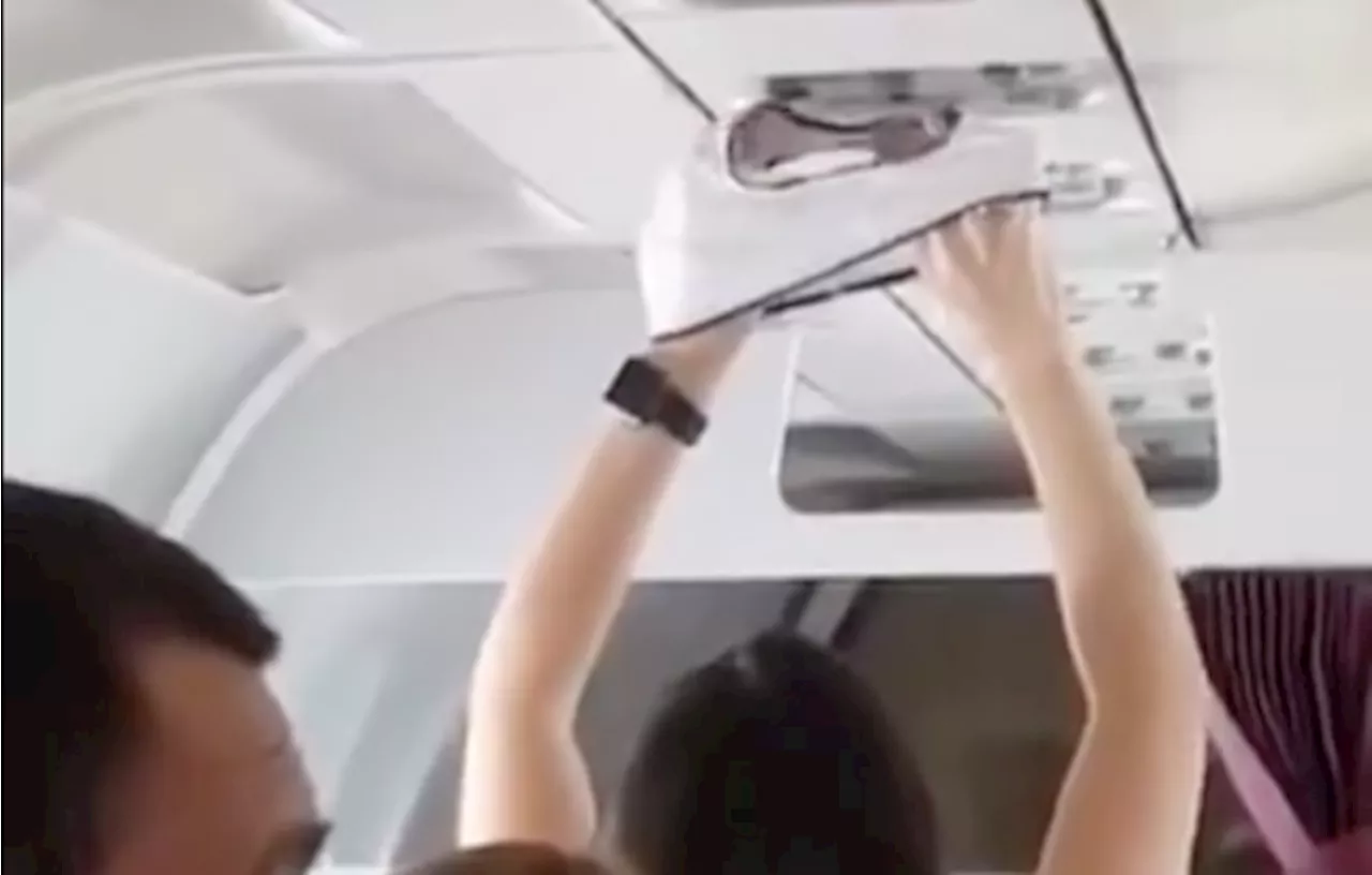 Woman filmed drying her knickers with overhead vent on an airplane