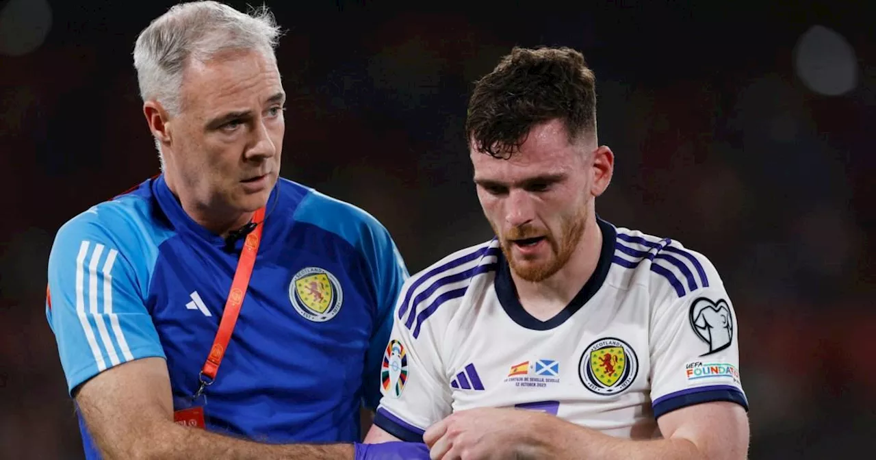 Liverpool suffer Andy Robertson injury scare as defender is forced off with Scotland