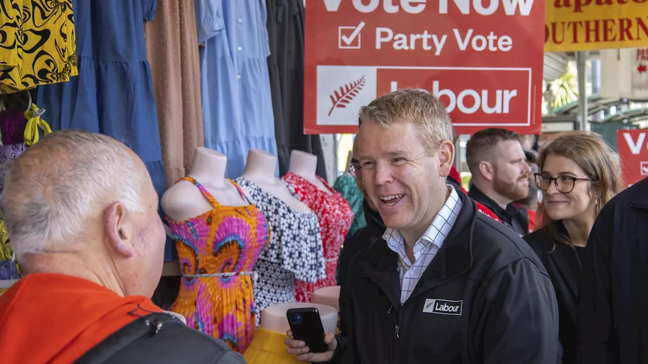 New Zealand political candidates dance and hug on the final day of election campaign