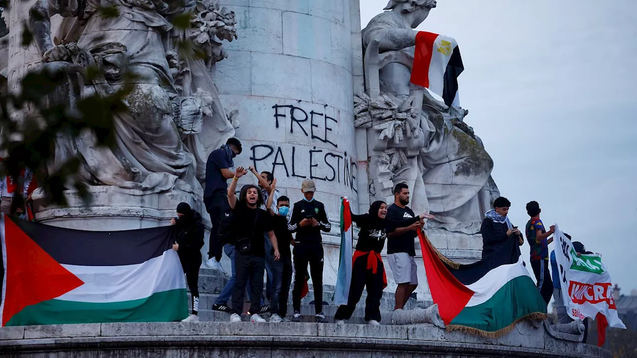 Paris police turn water cannons and tear gas on pro-Palestine demonstrators as French minister says...