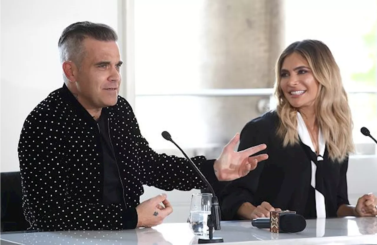 Ouch! People are slamming Ayda Field for wearing white to the royal wedding