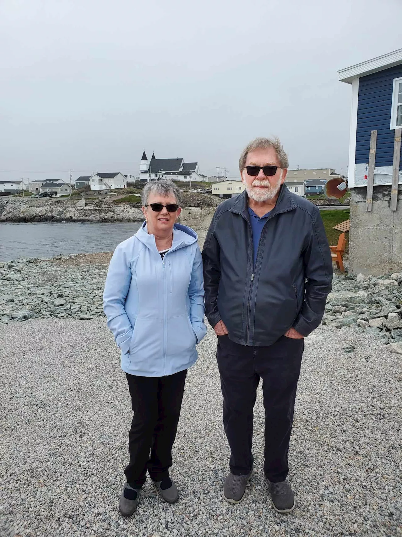 Two Port aux Basques couples, two homes destroyed