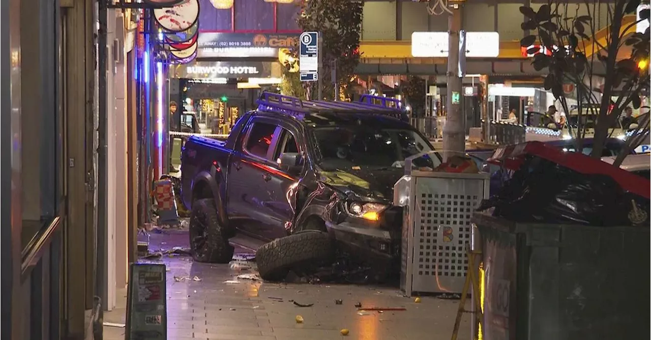 Five pedestrians rushed to hospital after car mounts footpath in Sydney