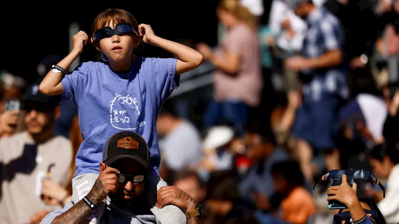 Thousands gather at the Perot to view rare solar eclipse in Dallas