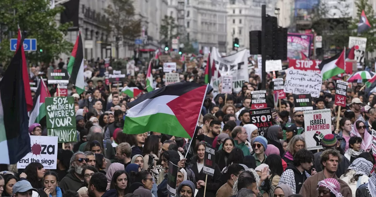 UK threatens arrests for Hamas supporters as thousands of pro-Palestine protesters flood streets