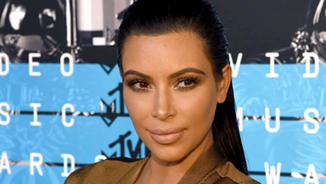 Queen’s University tells students not to dress like Kim Kardashian for Graduation day