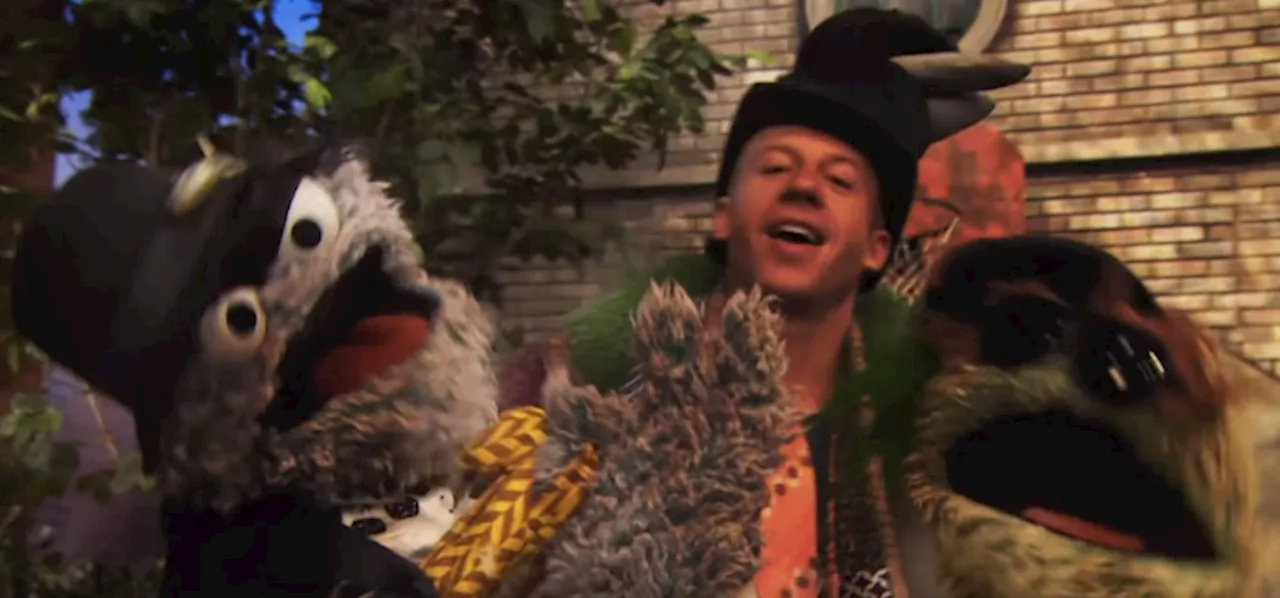 WATCH: Macklemore’s Street Credit Goes Through The Roof As He Duets With Oscar The Grouch