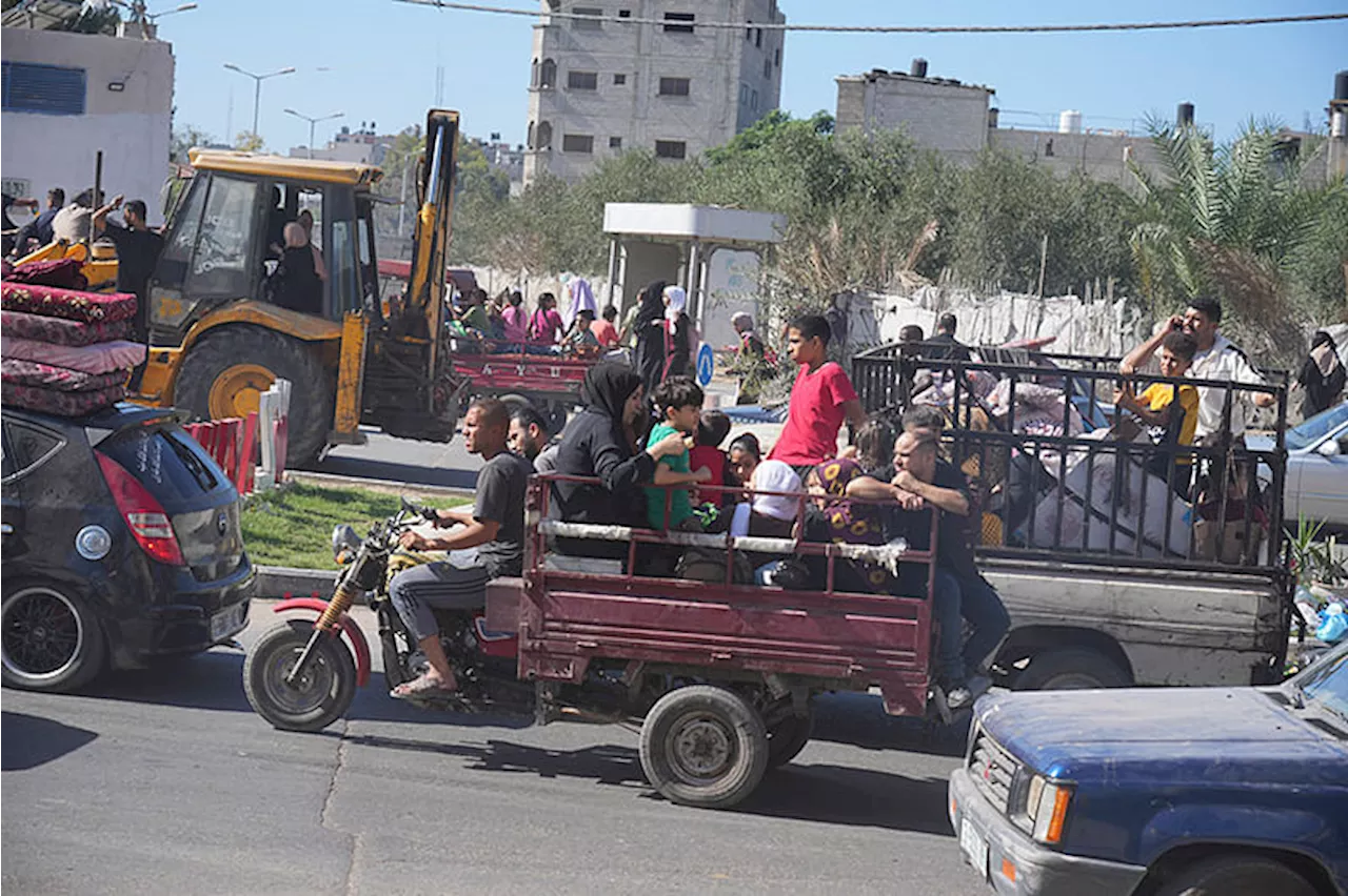 Palestinians flee northern Gaza after Israel orders 1 million to evacuate as ground attack looms