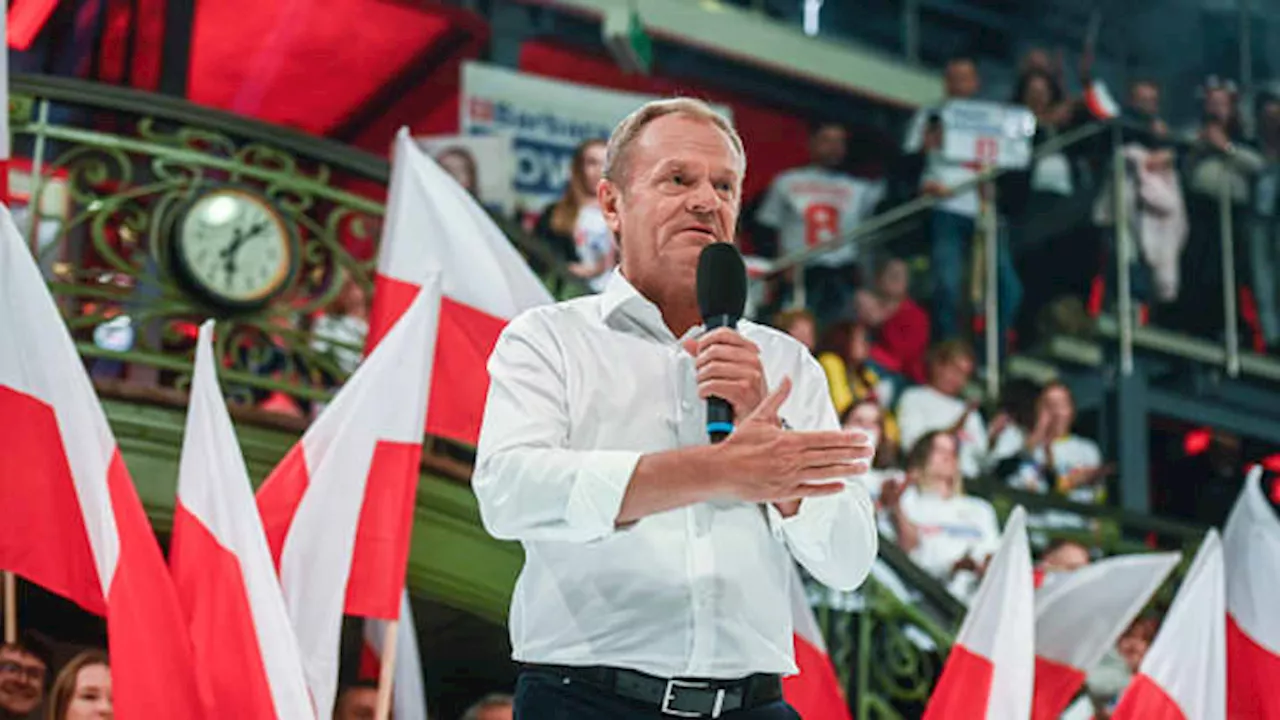 Poland's election result on a knife edge as opposition leader Donald Tusk claims victory